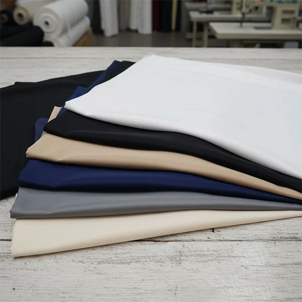 Kain lapisan viscose calendered Kain lapisan viscose calendered